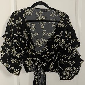 Fashion Nova top can be tied in multiple ways to achieve your desired look!